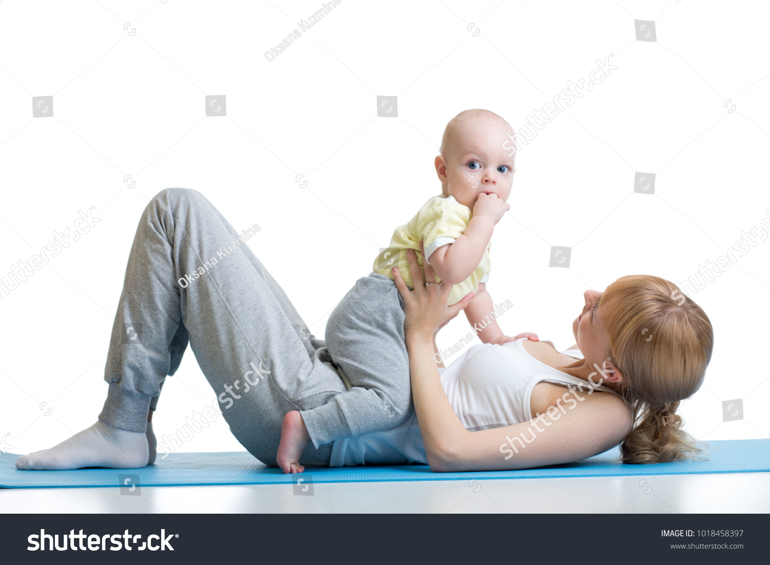 stock-photo-young-mother-does-fitness-exercises-together-with-baby-boy ...